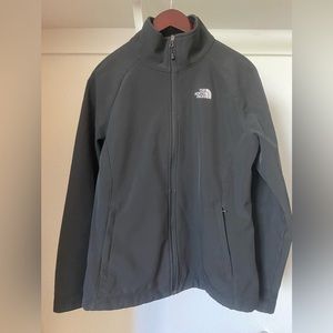 Women’s north face black zip front windwall.